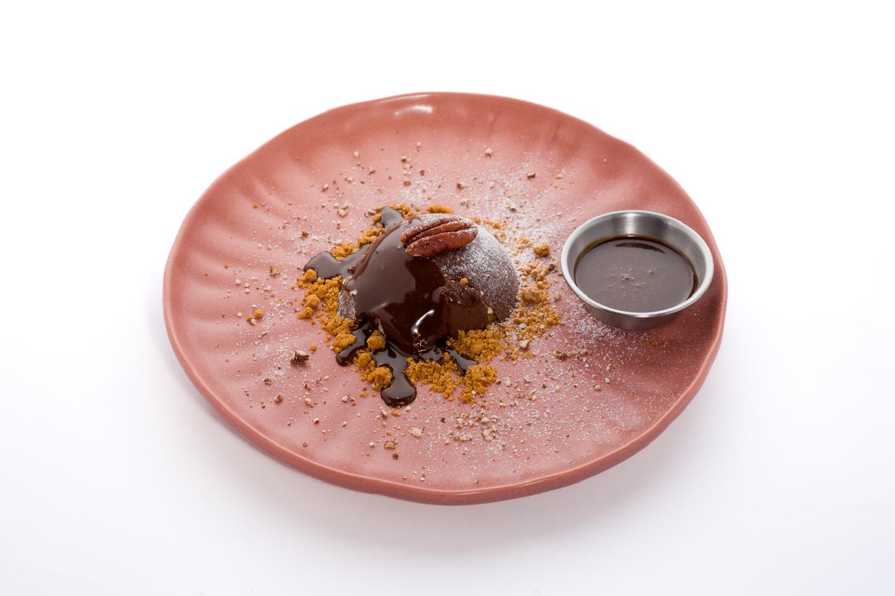 Sfera — Chocolate sphere, lotus, cheesecake mix, caramelized pecans, Coffee sauce