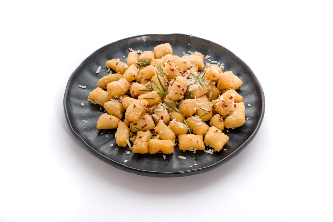 Tocchetti — Pizza Dough, Parmesan Cheese, Chili Flakes, Garlic butter